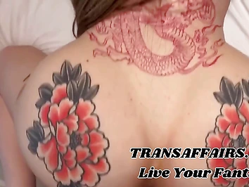 Thick tattooed tranny loves big shaft in her ass